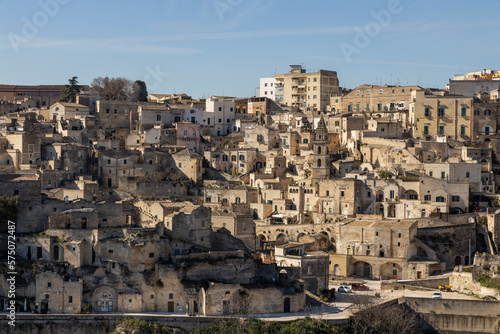 Fototapeta Naklejka Na Ścianę i Meble -  Panorama of Matera, a UNESCO World Heritage Site. European Capital of Culture. View from the Murgia Park. Timeless walk inside Paleolithic caves. City similar to Jerusalem. Unforgettable journey