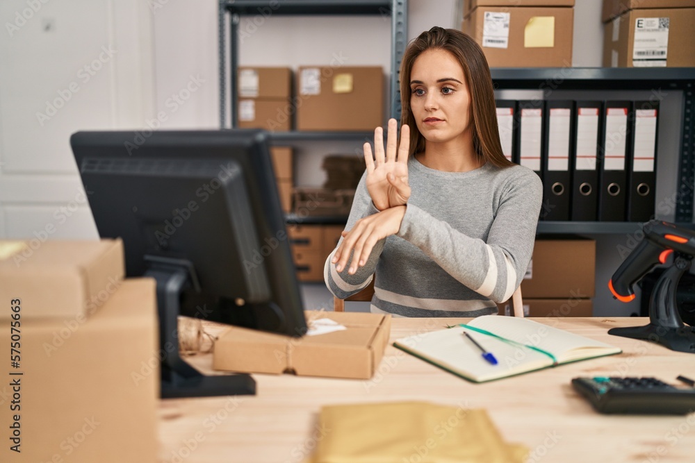 Young blonde woman ecommerce business worker having online deaf language conversation at office Young blonde woman ecommerce business worker having online deaf language conversation at office