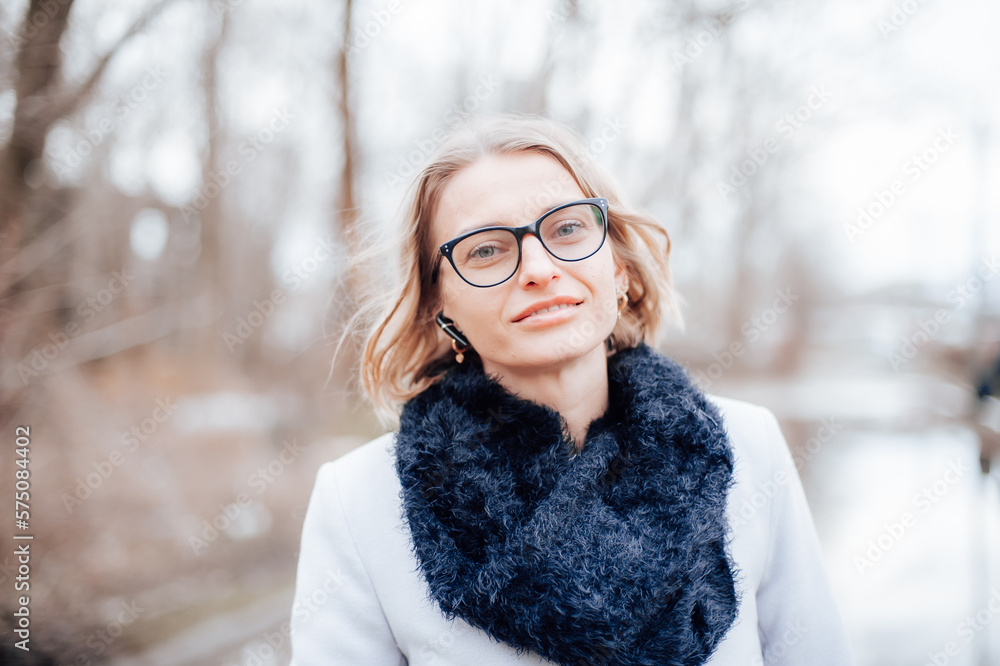 portrait of a woman in a winter park portrait of a woman in a winter park