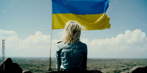 Beautiful strong woman looks at Ukrainian flag  Generative AI