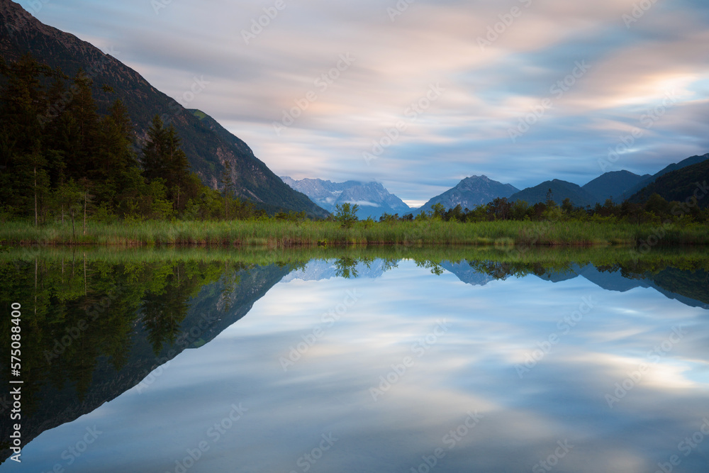 Zugspitze massif is reflected in the seven springs near Eschenlohe - Germany Alps - Bavaria Zugspitze massif is reflected in the seven springs near Eschenlohe - Germany Alps - Bavaria