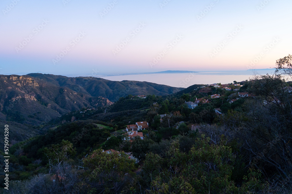 Sunset views from the Santa Monica Mountains while hiking, looking down on the city of Los Angeles and the Santa Monica Bay.