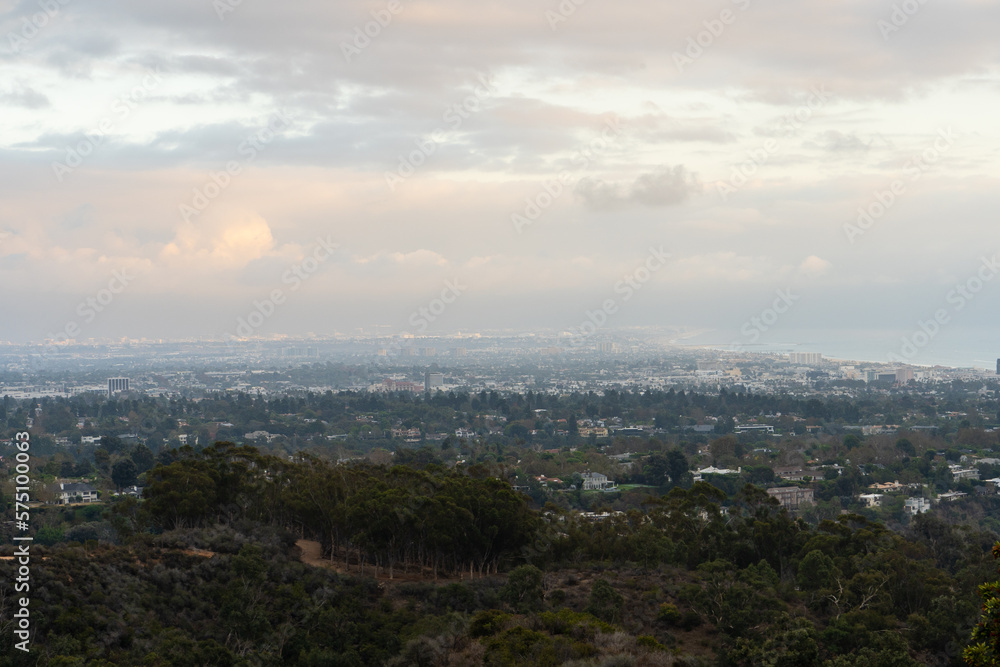 Sunset views from the Santa Monica Mountains while hiking, looking down on the city of Los Angeles and the Santa Monica Bay.