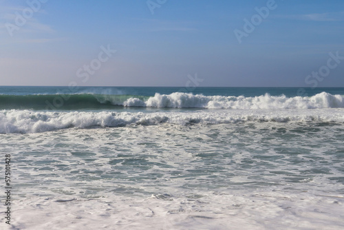 Waves in the ocean near Lisbon, Portugal on a sunny, windy winter day. © Kari