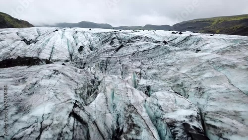 Wallpaper Mural Aerial drone footage of Solheimajokull glacier, part of Myrdalsjokull in Iceland. Melting glacier in Iceland. Global warming effect, climate change. Torontodigital.ca