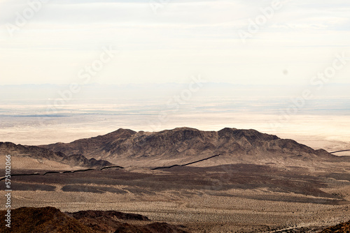 mountains of baja california where the border line with the usa can be seen in the distance