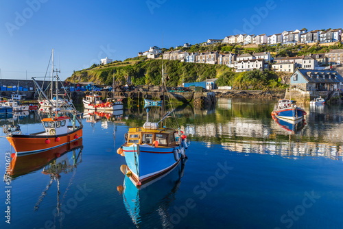 Mevagissey inner harbour in Cornwall on a beautiful summer morning.