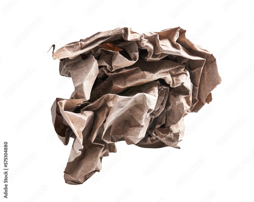 One brown crumpled paper ball over isolated white background One brown crumpled paper ball over isolated white background