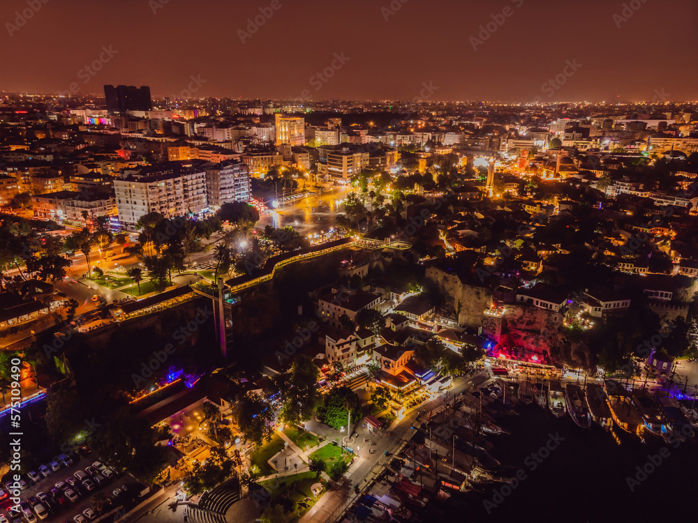 Night top aerial view of the old town Kaleici and old harbor in Antalya, Turkey. Turkey is a popular tourist destination
