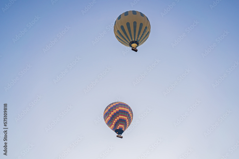 Fototapeta premium Beautiful hot air balloons over blue sky