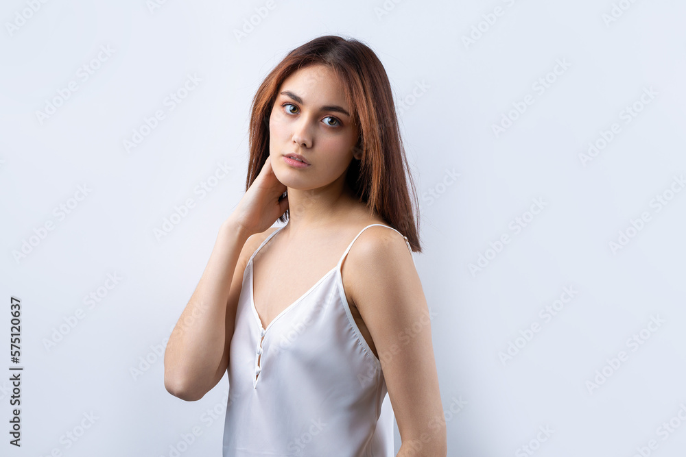 Beautiful smiling woman with clean skin, natural make-up and white teeth on a gray background Beautiful smiling woman with clean skin, natural make-up and white teeth on a gray background