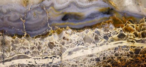 Obraz na plátně Texture of a colorful natural stone with layer structure as a background