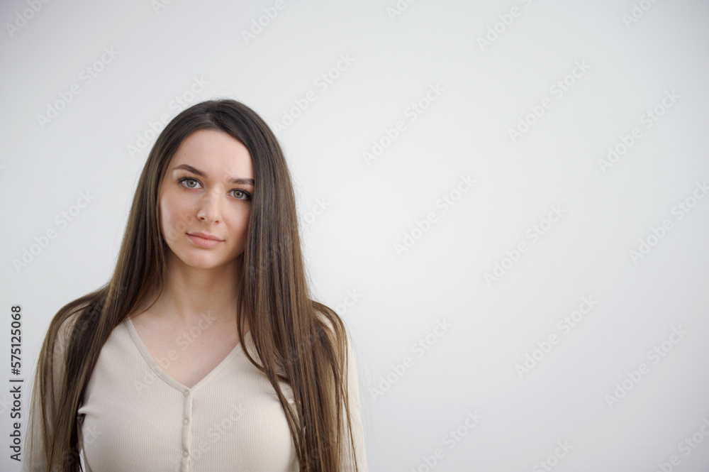 beauty woman portrait of girl beautiful cheerful enjoying with long brown hair and clean skin isolated on white background. High quality photo beauty woman portrait of girl beautiful cheerful enjoying with long brown hair and clean skin isolated on white background. High quality photo