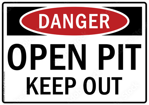 Open pit hazard sign and labels keep out