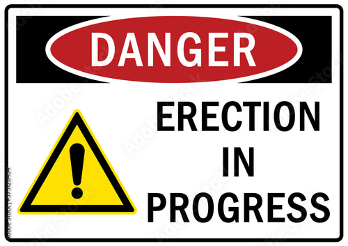 Open pit hazard sign and labels erection in progress