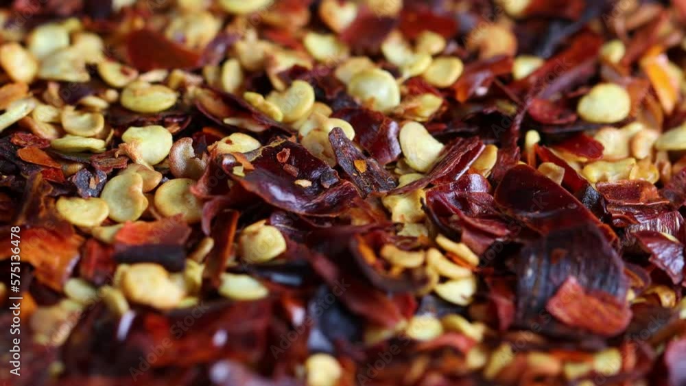 hot chili flakes in motion as background 4k 30fps video hot chili flakes in motion as background 4k 30fps video