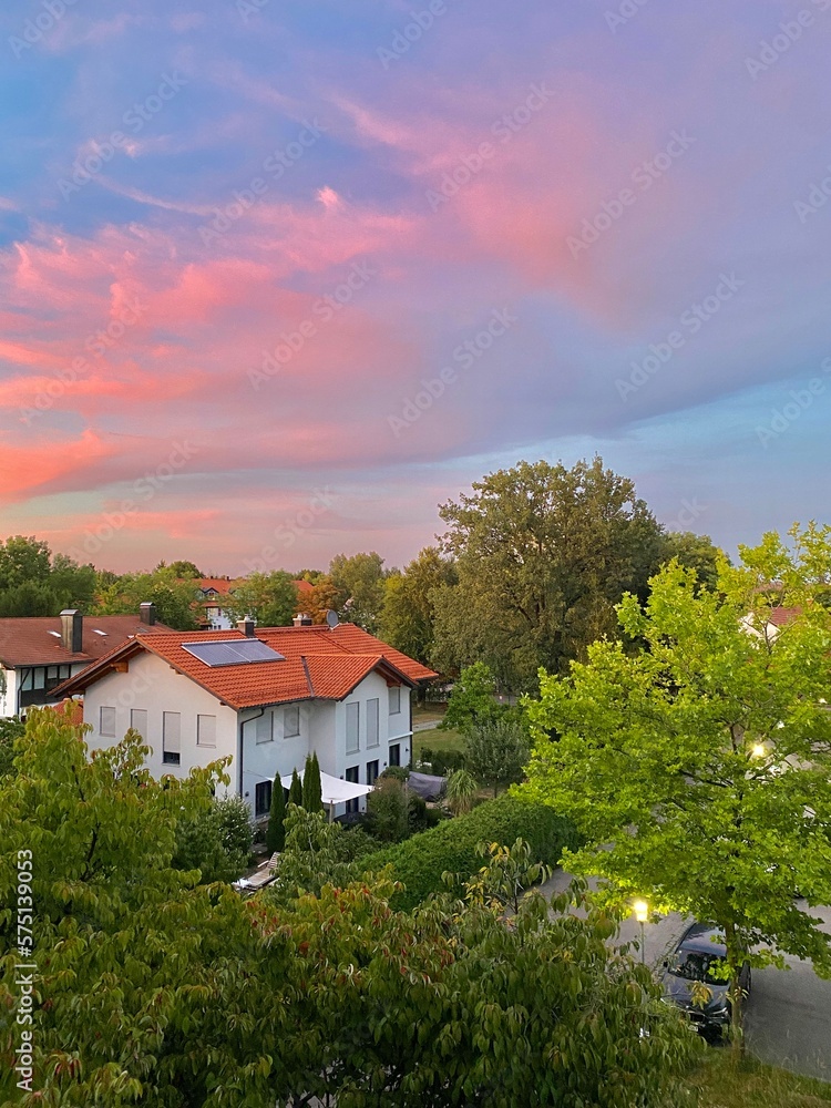 houses and pink sky