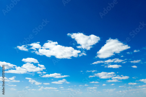 Blue sky with white clouds. © Pakhnyushchyy