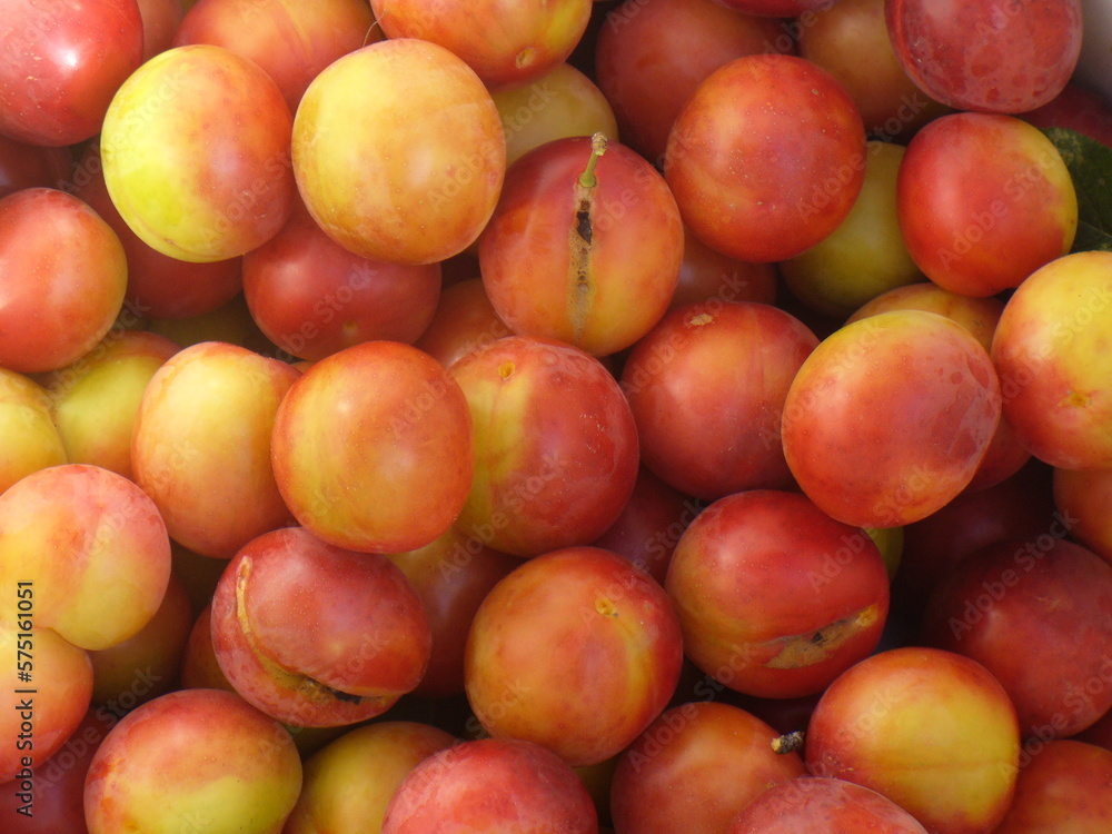 red plums background red plums background