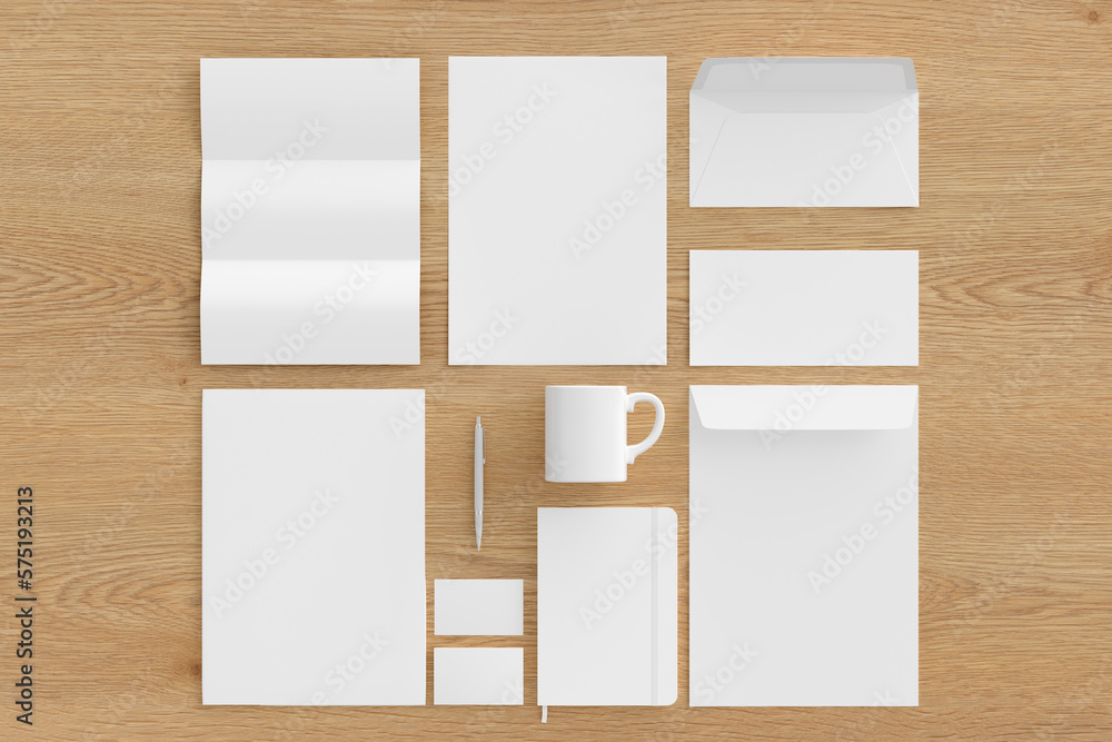 Blank corporate stationery set mockup with envelopes, business cards, folder, trifold brochure, paper sheet, notebook, cup and pen on wooden background. Branding mock up. View directly above. Blank corporate stationery set mockup with envelopes, business cards, folder, trifold brochure, paper sheet, notebook, cup and pen on wooden background. Branding mock up. View directly above.