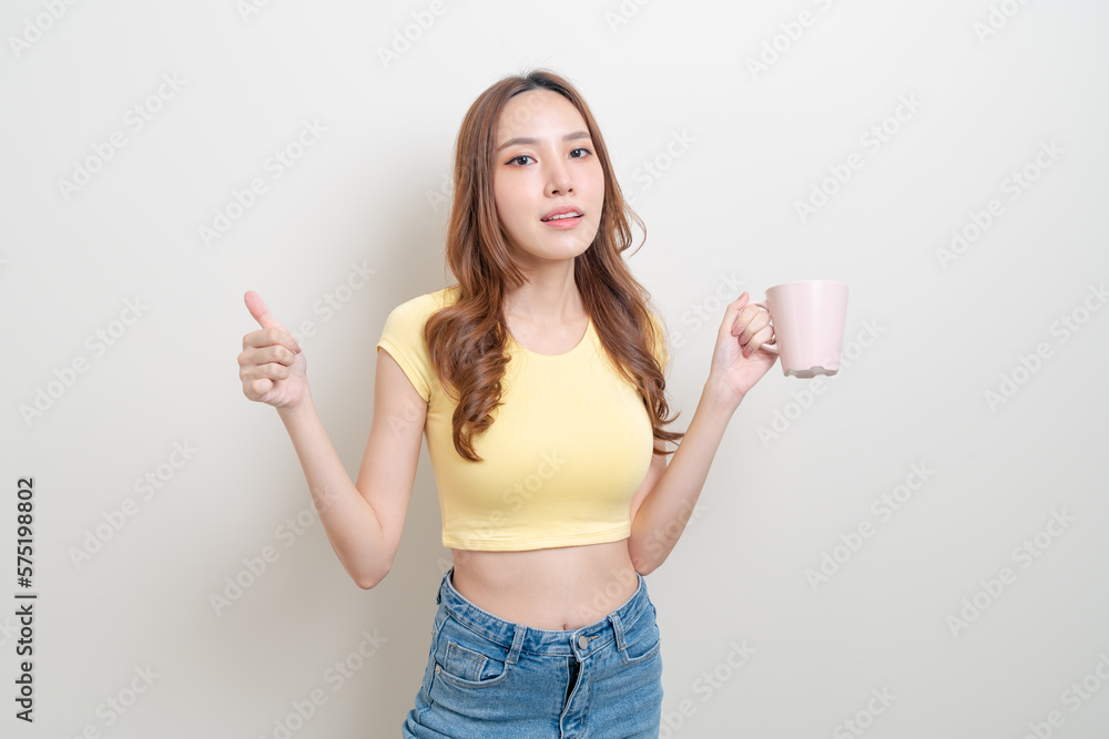 portrait beautiful Asian woman holding coffee cup or mug portrait beautiful Asian woman holding coffee cup or mug