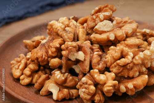 plate of peeled walnuts