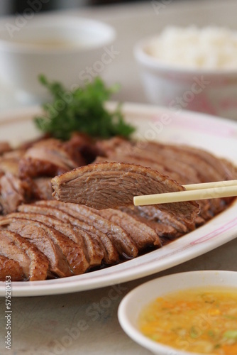 Steamed duck Thai cuisine in dish on white street food Thailand or food Chinese