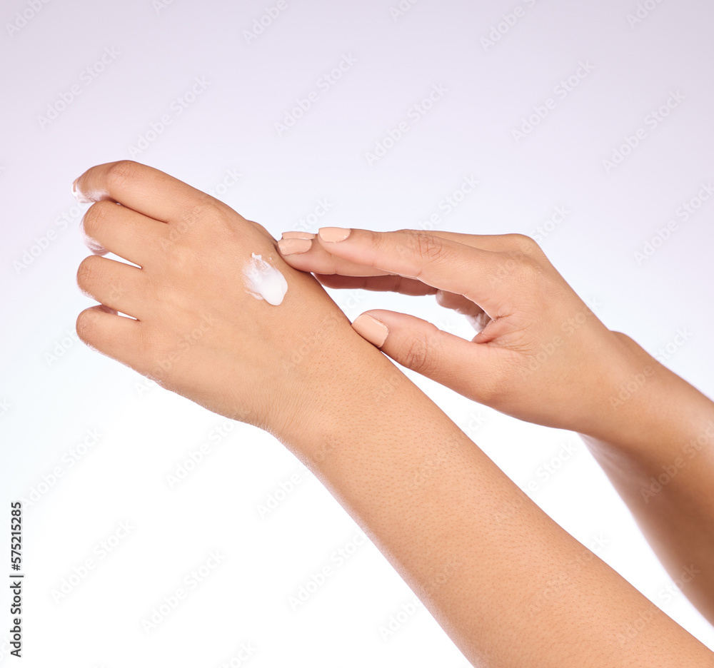 Hands, cream and beauty, skincare and woman, manicure and nail polish with cosmetics on studio background. Sunscreen, moisturizer application and dermatology with lotion cosmetic product and female