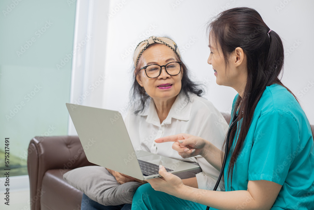 Asian female doctor explaining to educate medical Information about life planning with senior patient