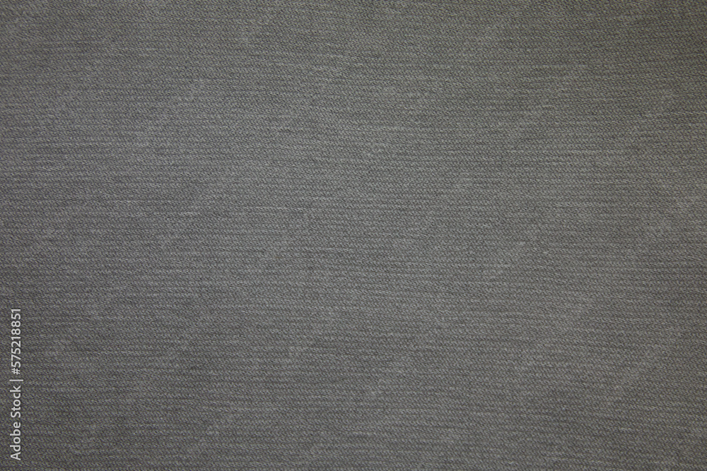Grey jeans fabric background texture. Grey jeans fabric cloth textile material. Grey jeans fabric background texture. Grey jeans fabric cloth textile material.