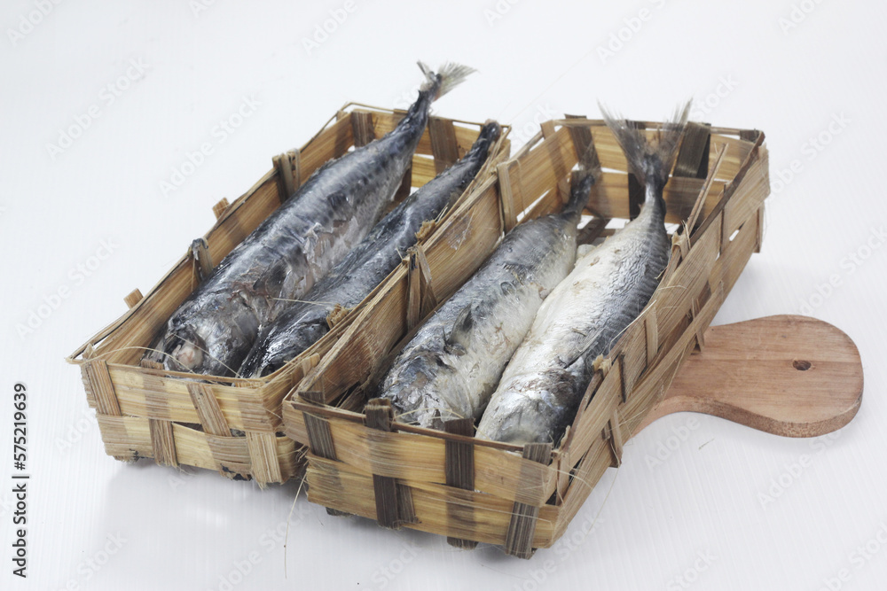 pindang fish (salted fish) in a bamboo container, is one of the ...