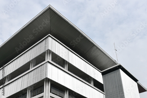 Minimalist building exterior using long stainless steel 