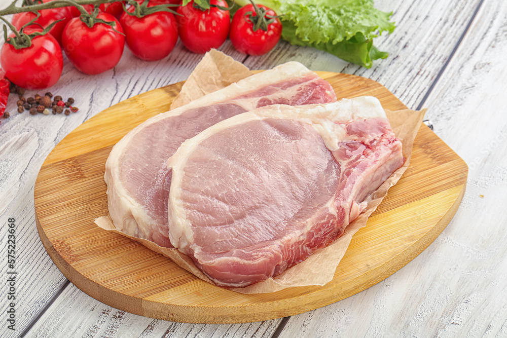 Raw pork t-bone steak for grill