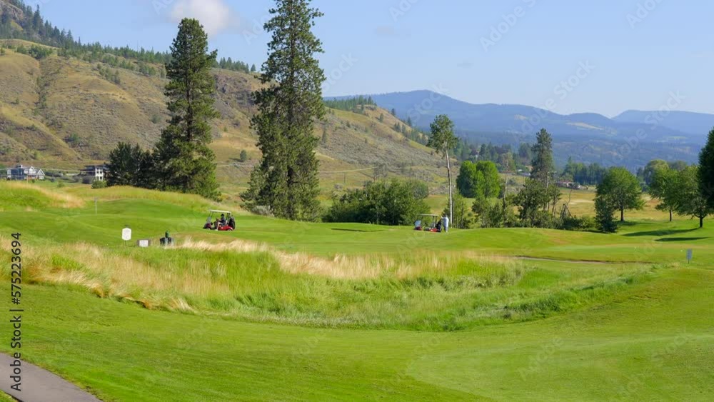 Establishing shot of golf course with gorgeous green and fantastic forest view in Vancouver, Canada, North America. Day time on May 2022. Still camera. ProRes 422 HQ.
