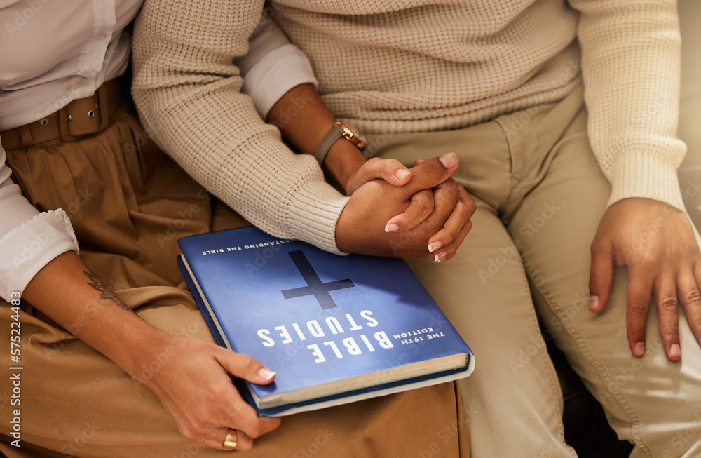 Love, bible and couple holding hands, studying and support with religious practice, teaching and growth for marriage. Holy text, man and woman bonding, scripture and prayer with connection or healing Love, bible and couple holding hands, studying and support with religious practice, teaching and growth for marriage. Holy text, man and woman bonding, scripture and prayer with connection or healing