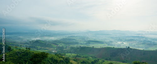 Beautiful landscape of mountain with view into misty valley in morning time. fog in a mountains valley panorama view.