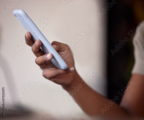 Woman, hands and typing on smartphone for connection, social media post and reading notification. Closeup female with mobile app, technology and search internet on website, digital network or contact