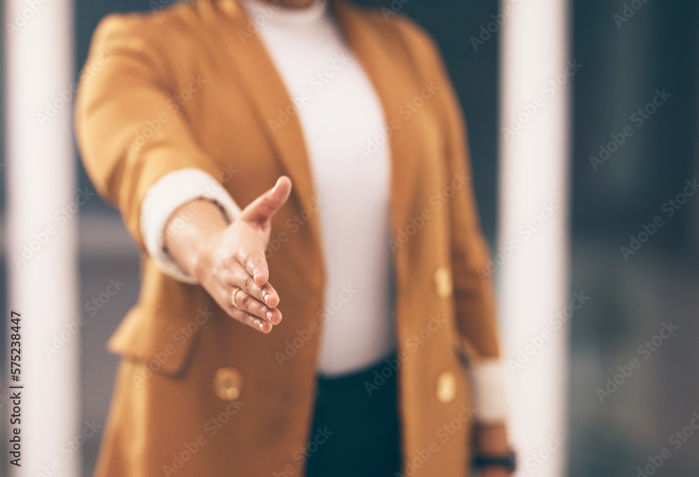 Professional woman with a handshake gesture for greeting, welcome or partnership in office. Company, corporate and female employee stretching hand for shaking hands for agreement in modern workplace. Professional woman with a handshake gesture for greeting, welcome or partnership in office. Company, corporate and female employee stretching hand for shaking hands for agreement in modern workplace.