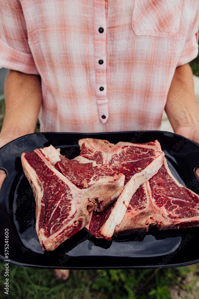 t bone steak on a platter