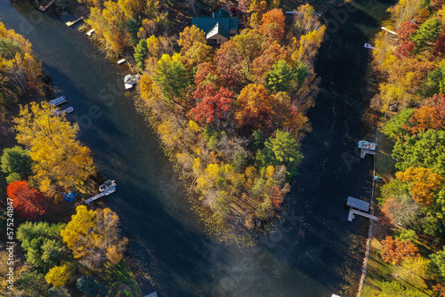 Boat docks and fall colored trees.