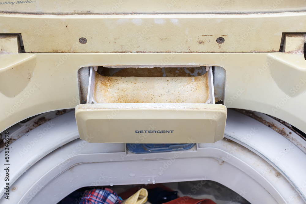 washing machine drawer compartments. dirty washing powder tray Stock