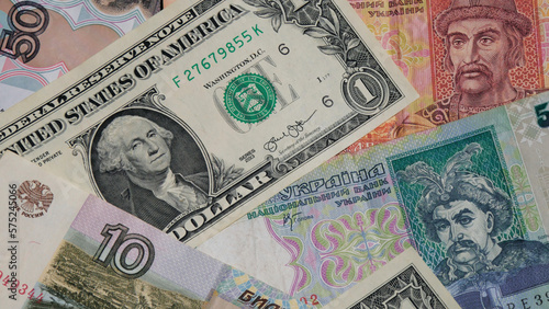 Money from different countries. American Dollar, Ukrainian Hryvnia, Russian Rubles