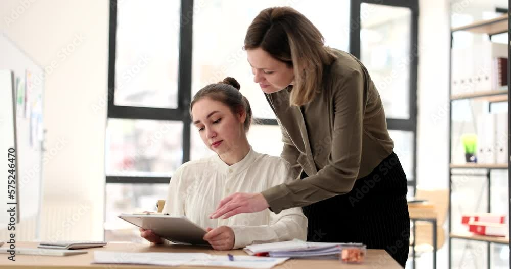 Seo leader helps student girl with report on work Seo leader helps student girl with report on work