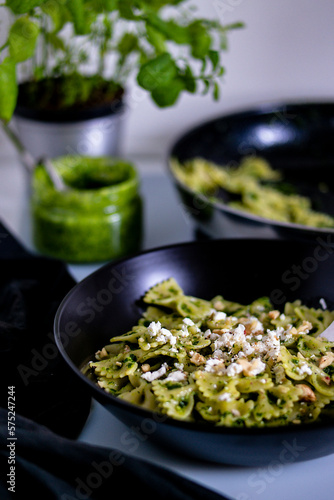 Pasta with pesto.Cooking process step by step in the kitchen.