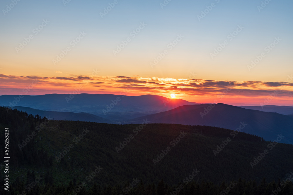 Sunset from Dlouhe strane hill in Jeseniky mountains in Czech republic