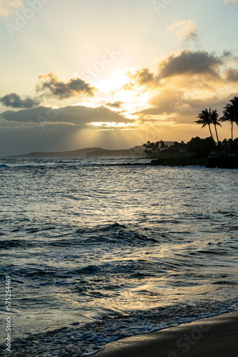 Watching the sunset at Poipu Beach in Kauai, Hawaii