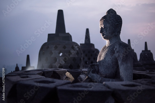 Buddha statue at the Borobudor temple in Java, Indonesia. photo