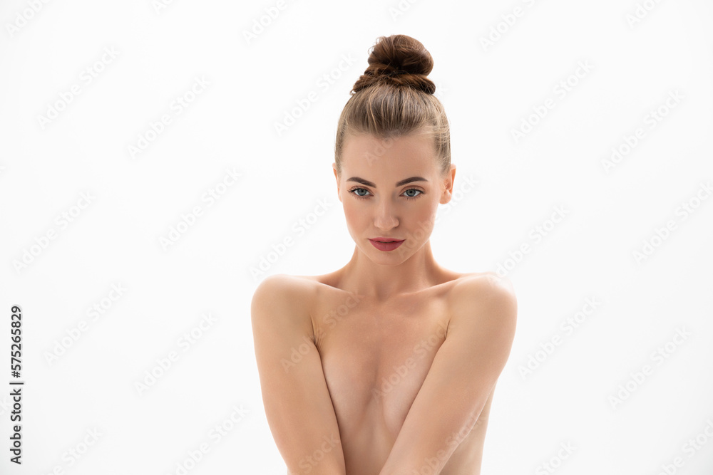 Beautiful young topless girl looking at the camera Beautiful young topless girl looking at the camera