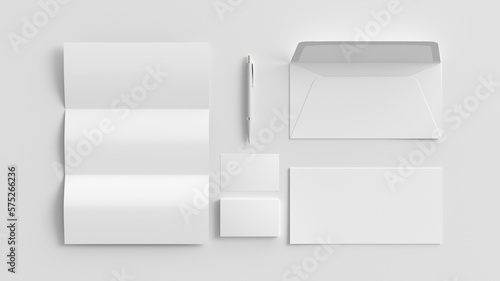 Blank corporate stationery set mockup on white background.  View directly above