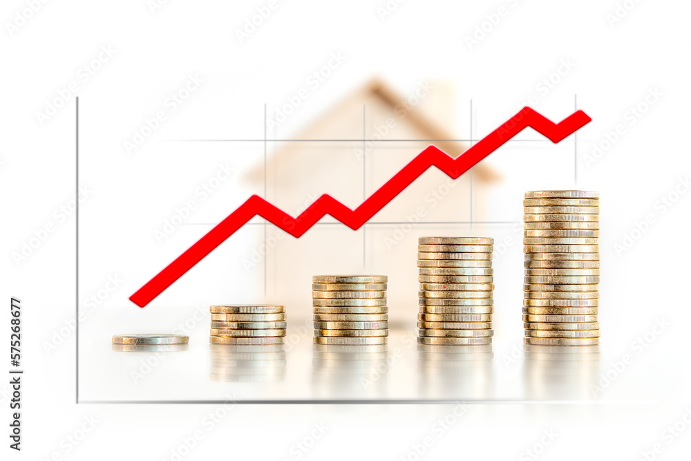 Graphic on coin towers showing the rise in mortgage, rental and housing prices. Selective focus. Graphic on coin towers showing the rise in mortgage, rental and housing prices. Selective focus.